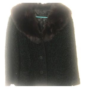 Women’s black faux Persian lamb fur coat